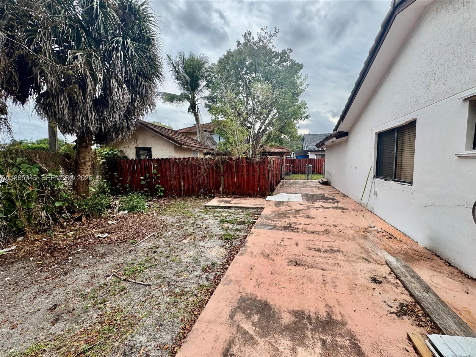 11178 Southwest 74th Terrace Miami, FL 33173 - Photo 9 of 18 a front view of a house with a yard