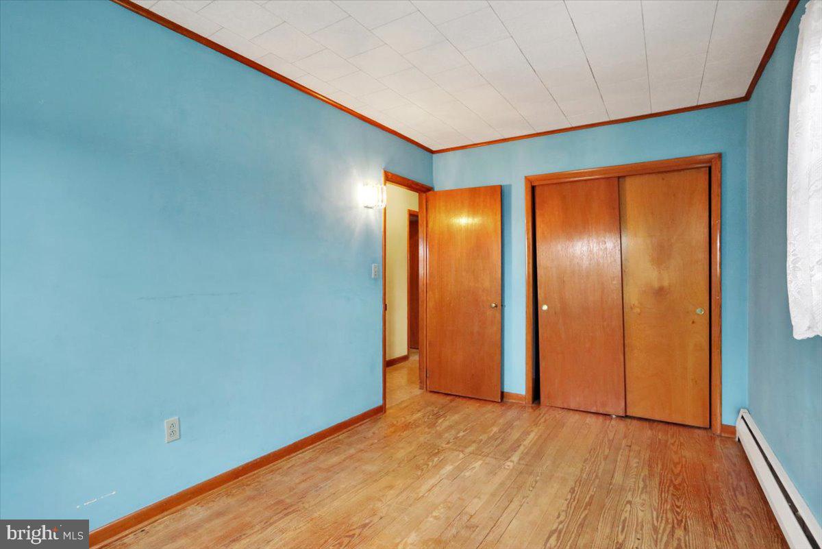 238 Grim Road Kutztown, PA 19530 - Photo 17 of 32 a view of empty room with wooden floor