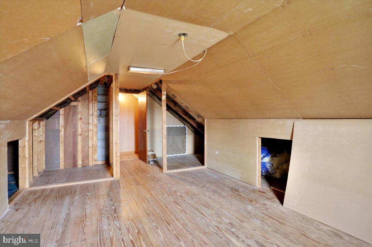 238 Grim Road Kutztown, PA 19530 - Photo 23 of 32 a view of a livingroom with wooden floor and a ceiling fan