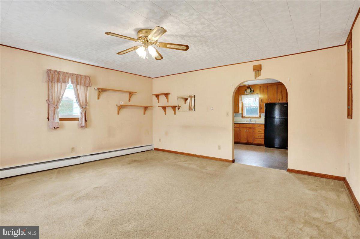 238 Grim Road Kutztown, PA 19530 - Photo 5 of 32 wooden floor in an empty room with a window