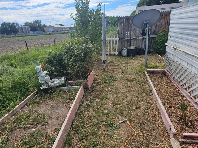 a view of sitting area in front of house