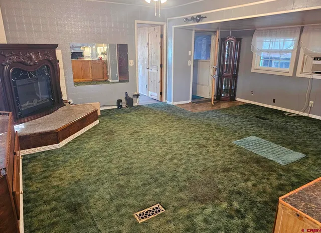 a bathroom with shower bathtub and window