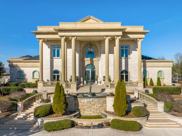 a view of a house with swimming pool