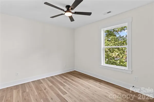 a workspace with furniture and a book shelf