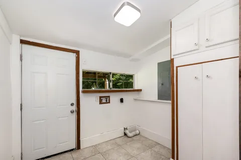 a view of kitchen with white refrigerator freezer and a dishwasher
