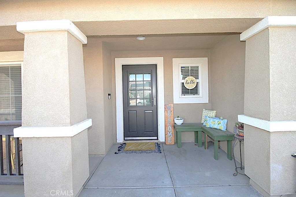 924 Condor Street Barstow, CA 92311 - Photo 4 of 52 a living room with a table and chairs