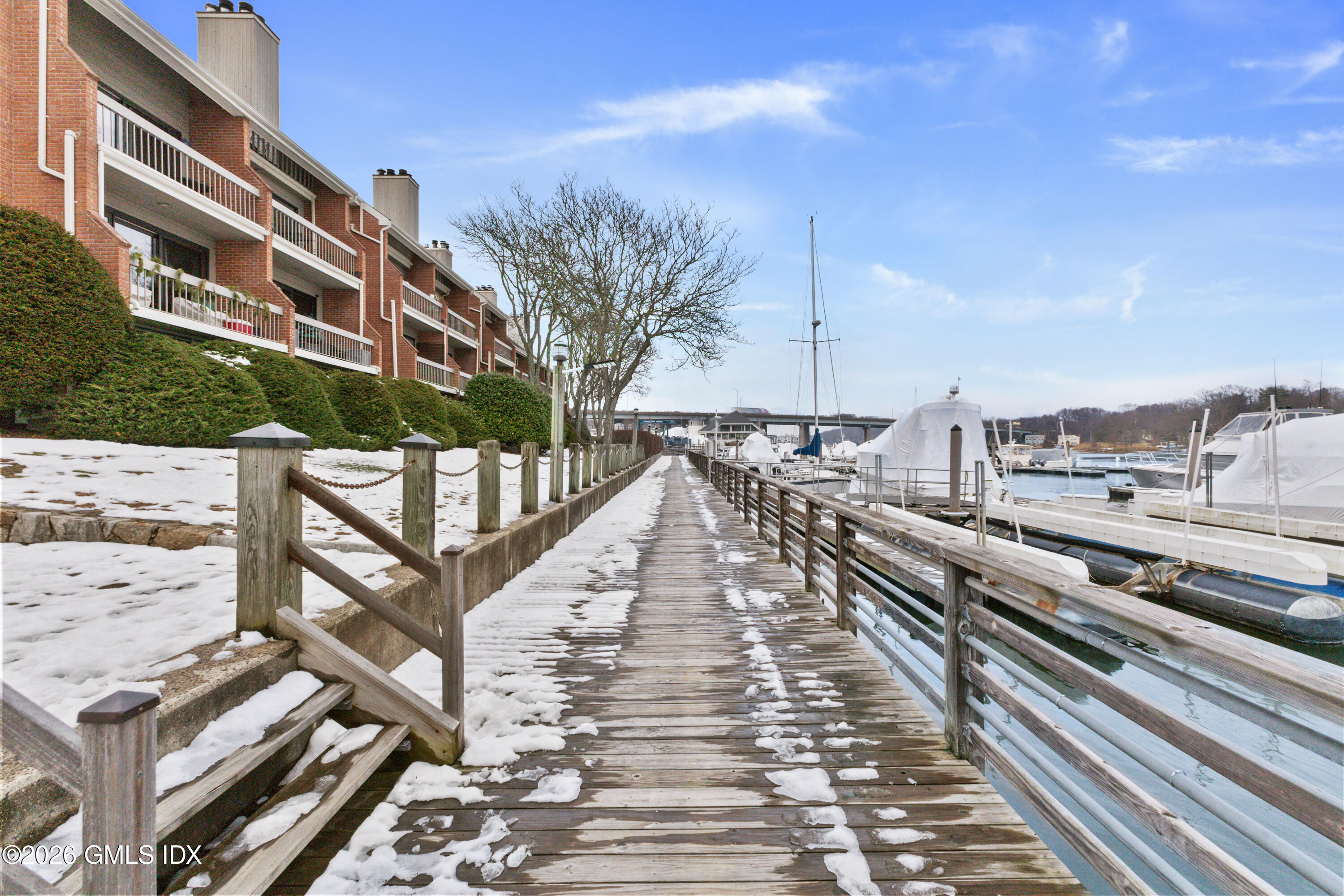 15 River Road, Unit 210 Cos Cob, CT 06807 - Photo 22 of 23 a view of a city with train tracks