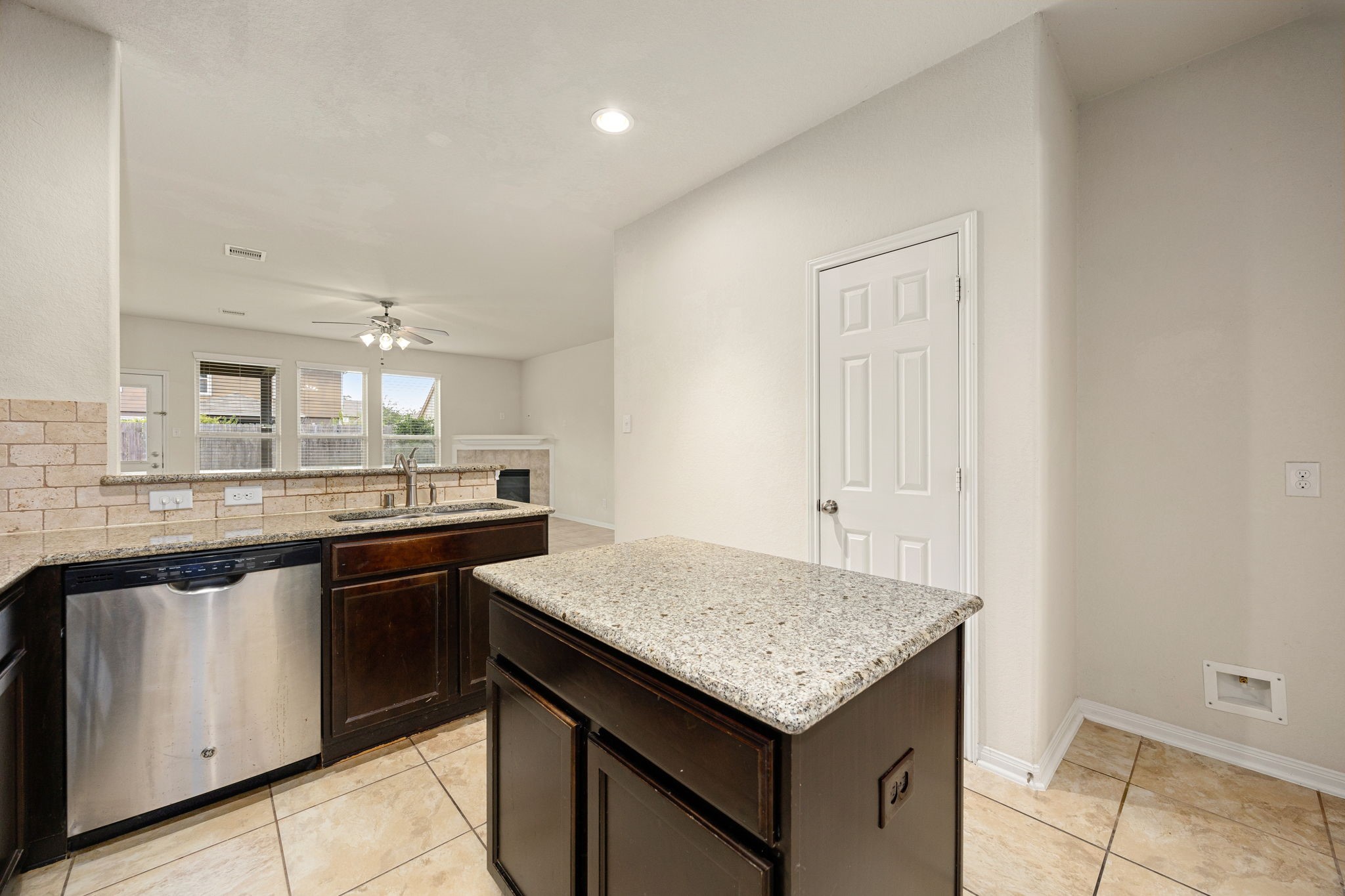 29322 Indian Clearing Spring, TX 77386 - Photo 20 of 41 a kitchen with a stove and a sink