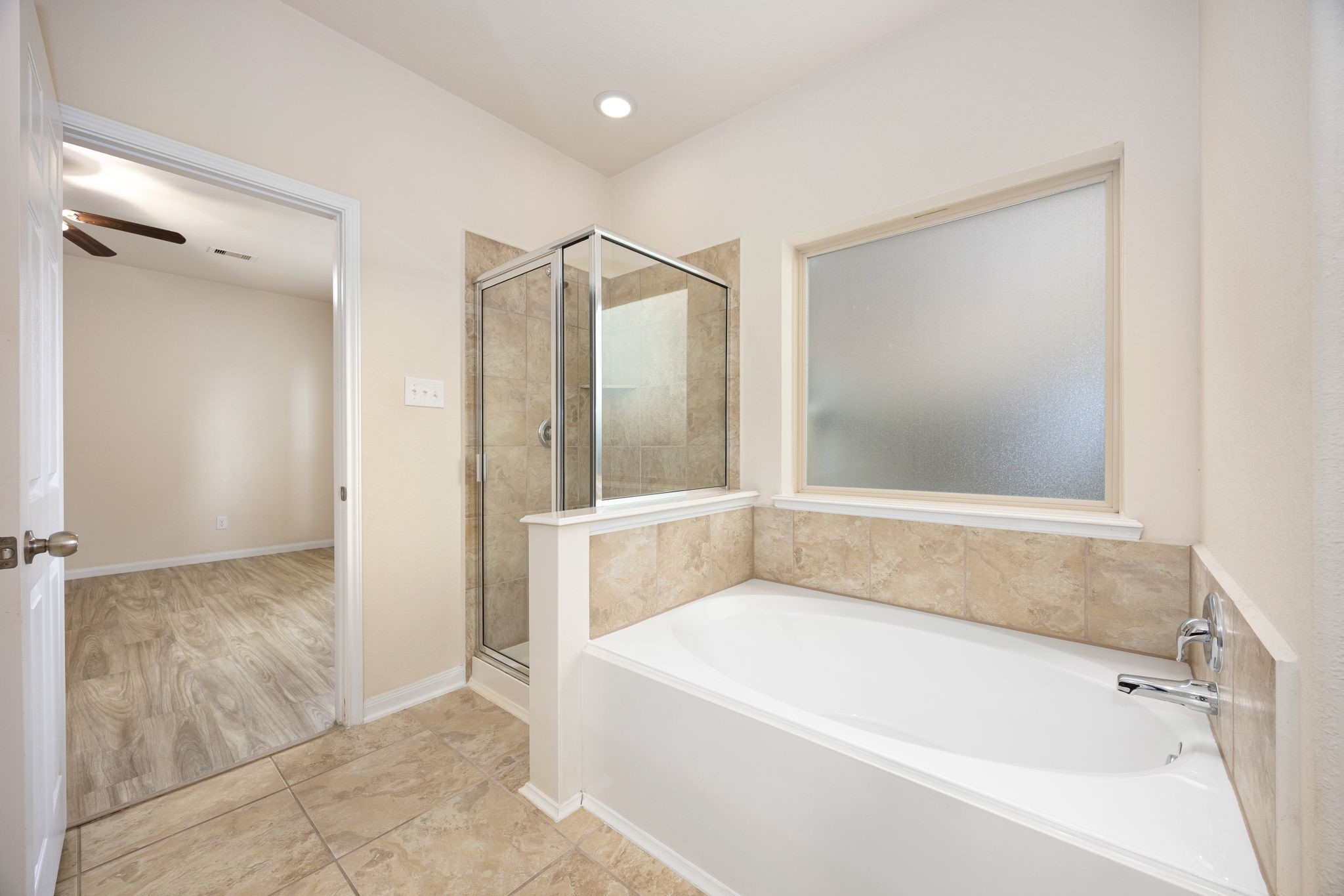 29322 Indian Clearing Spring, TX 77386 - Photo 29 of 41 a white bath tub sitting in a bathroom