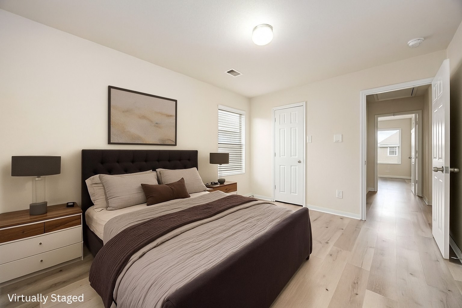 29322 Indian Clearing Spring, TX 77386 - Photo 10 of 41 a bedroom with a bed and a painting on the wall