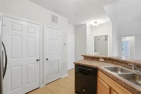 $235,000 | 9916 Courtney Palms Boulevard, Unit 302, Tampa, FL 33619