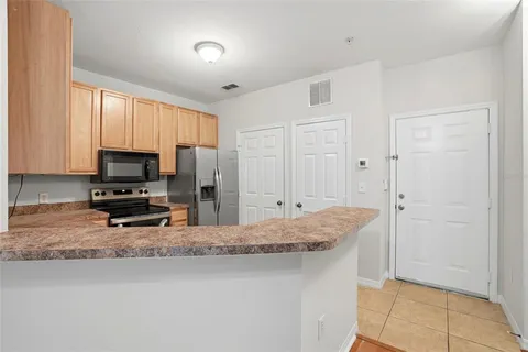 $235,000 | 9916 Courtney Palms Boulevard, Unit 302, Tampa, FL 33619