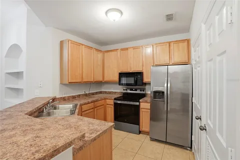 $235,000 | 9916 Courtney Palms Boulevard, Unit 302, Tampa, FL 33619