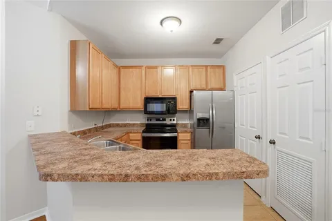 $235,000 | 9916 Courtney Palms Boulevard, Unit 302, Tampa, FL 33619