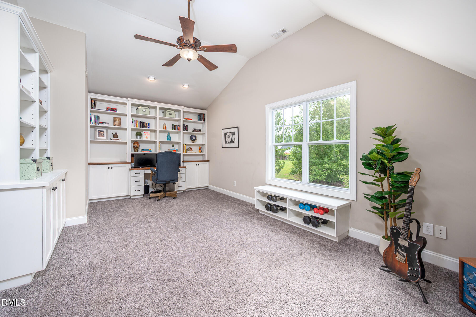726 Ruth Circle Fuquay-Varina, NC 27526 - Photo 38 of 61 a living room with furniture and a potted plant