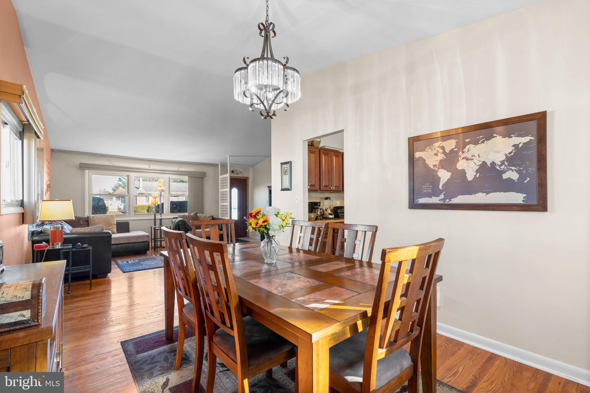 4727 Byron Road Windsor Mill, MD 21244 - Photo 11 of 35 a view of a dining room with furniture window and wooden floor