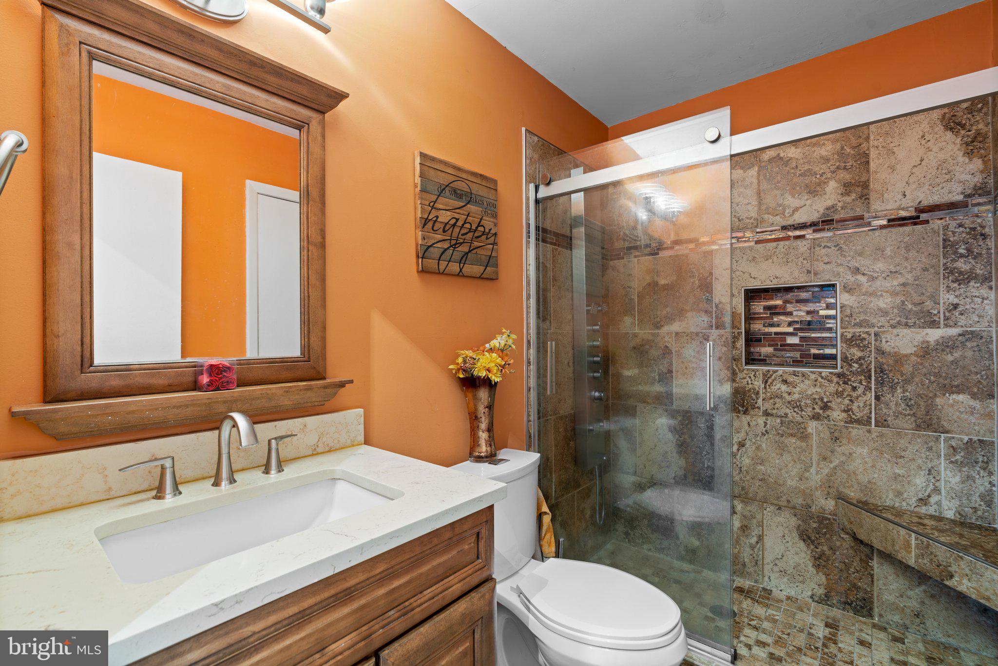 4727 Byron Road Windsor Mill, MD 21244 - Photo 17 of 35 a bathroom with a sink a toilet and shower