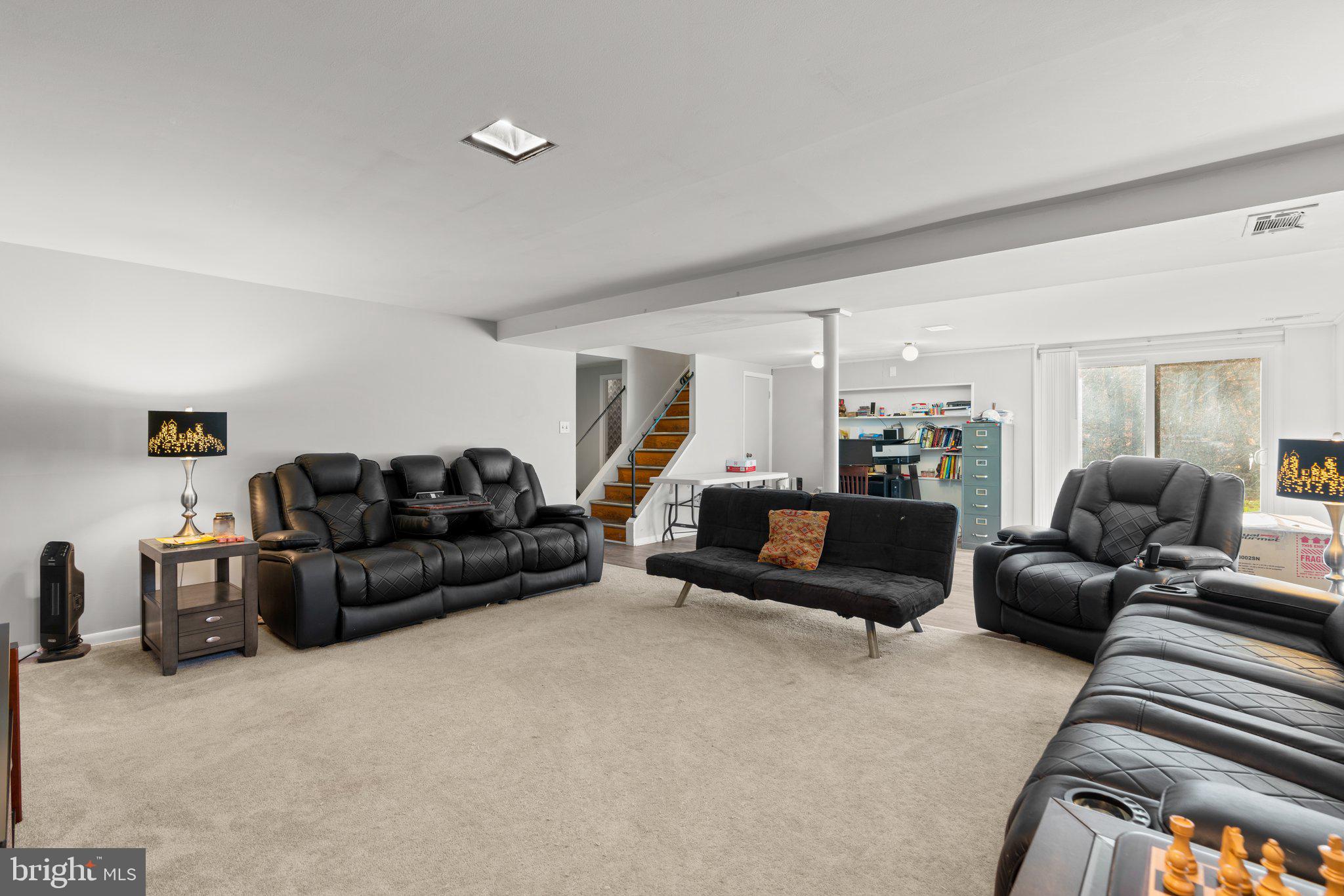 4727 Byron Road Windsor Mill, MD 21244 - Photo 26 of 35 a living room with furniture and a couch