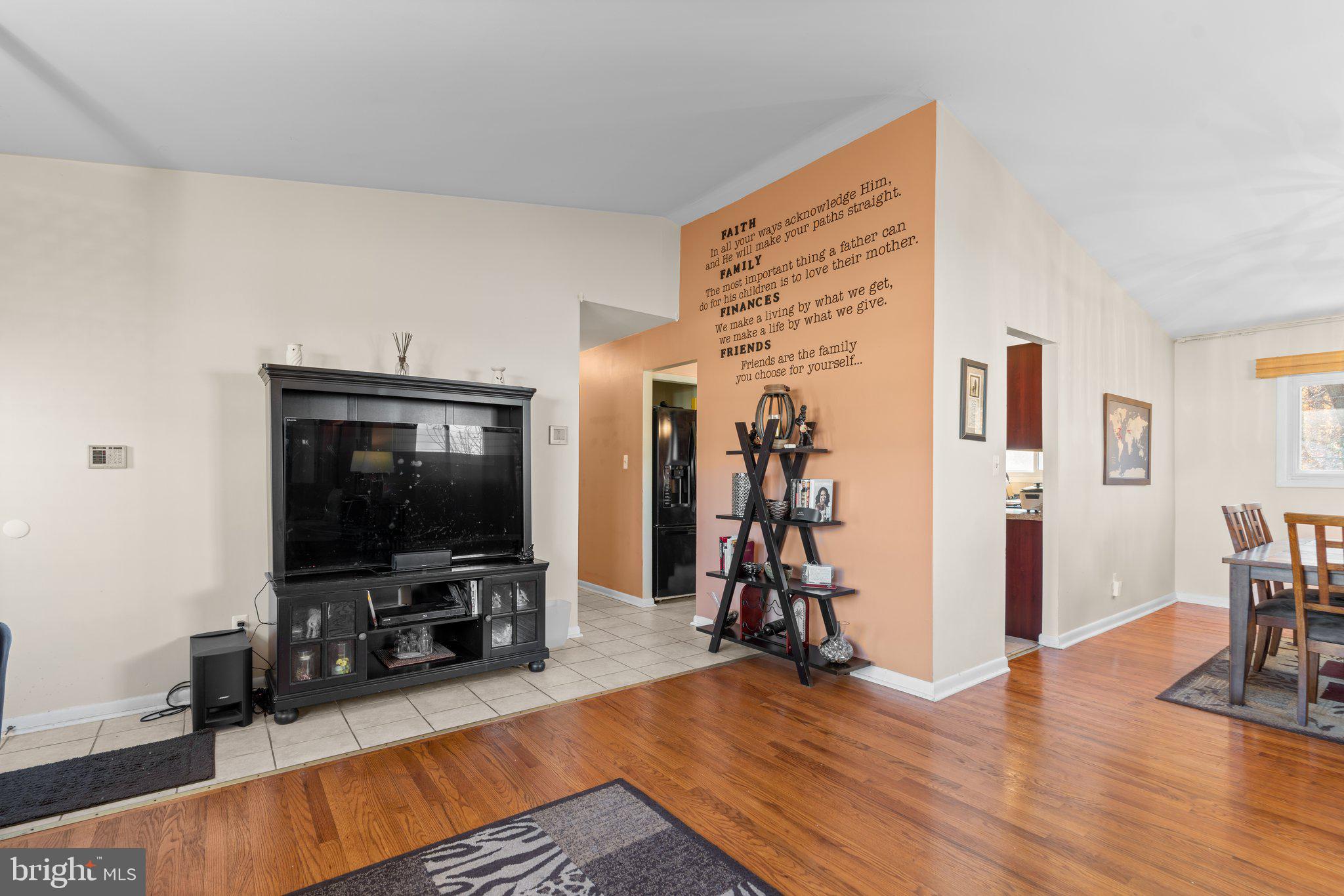 4727 Byron Road Windsor Mill, MD 21244 - Photo 8 of 35 a living room with furniture and a flat screen tv