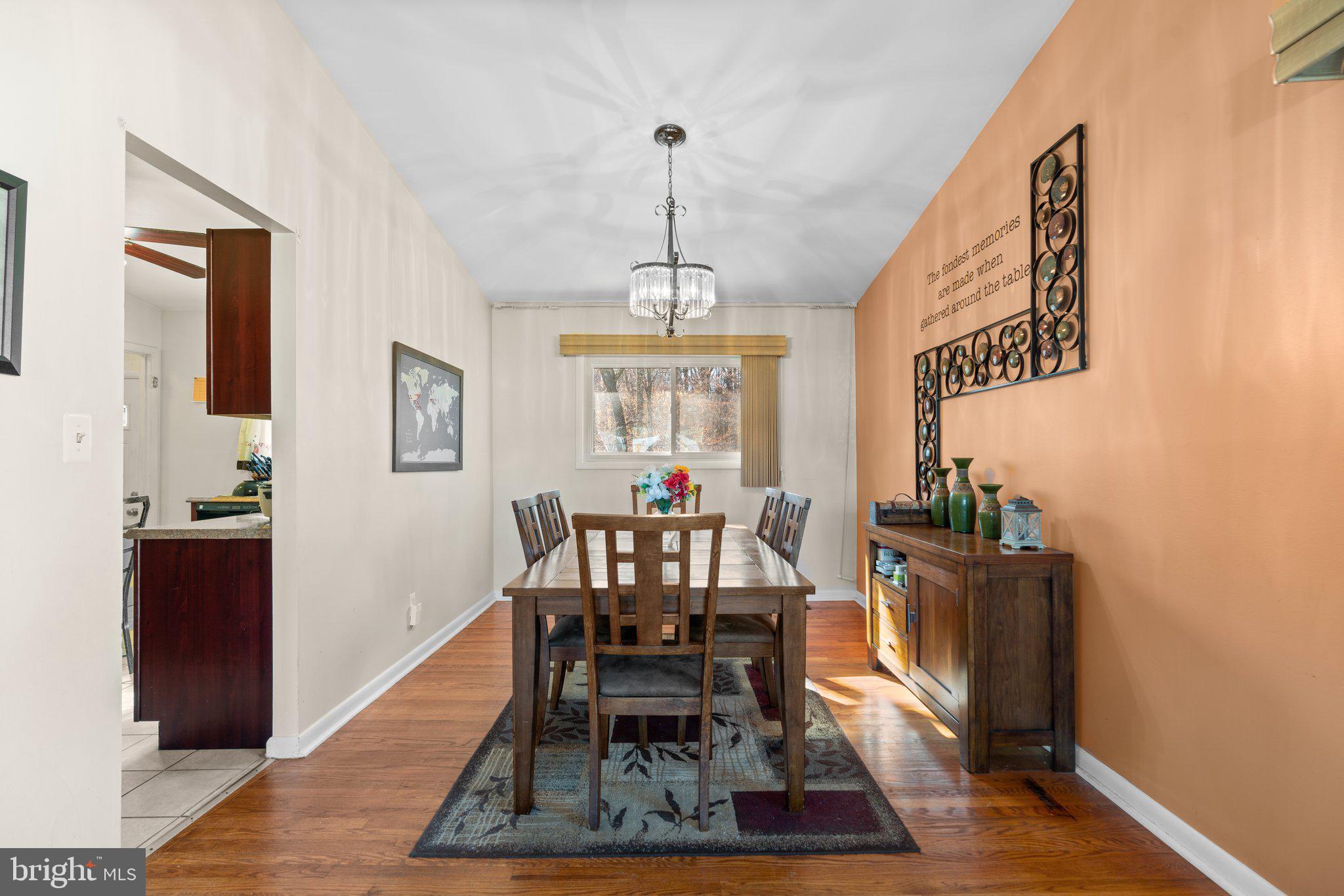 4727 Byron Road Windsor Mill, MD 21244 - Photo 9 of 35 a view of a dining room with furniture window and wooden floor