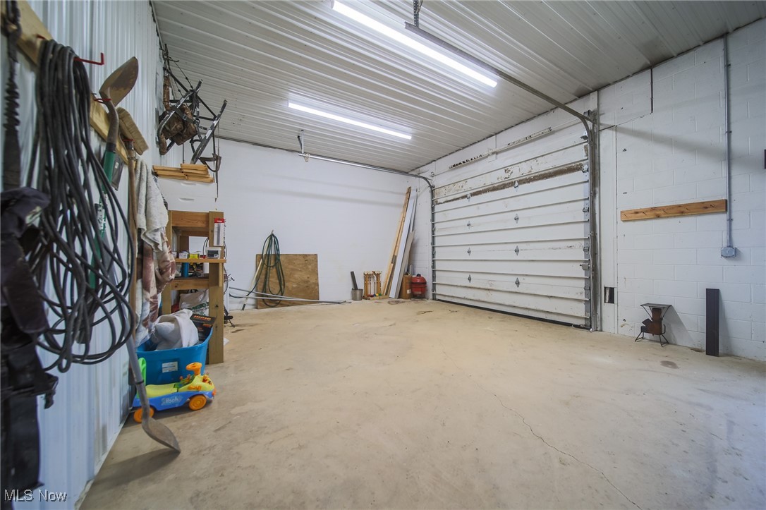 106 Township Road Rayland, OH 43943 - Photo 38 of 48 Garage with concrete block wall