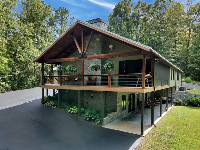 a view of a chair and table in the balcony