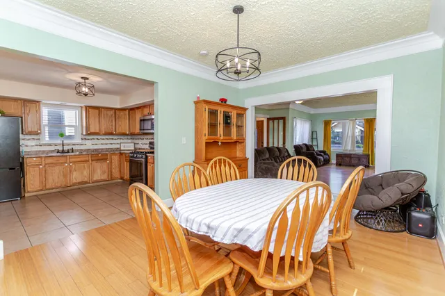 a view of a dining room with furniture