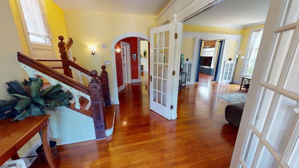 58 Market Street Onancock, VA 23417 - Photo 3 of 42 Check out this foyer and the woodwork on the stai, Many architectural details throughout.