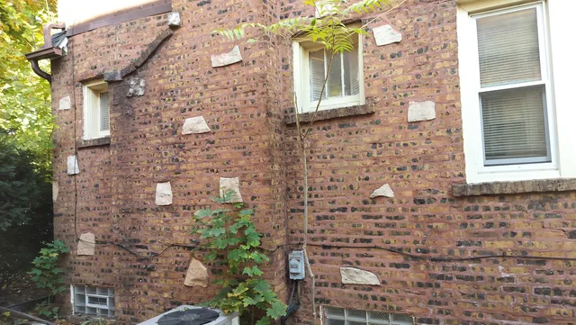 a brick building with a door