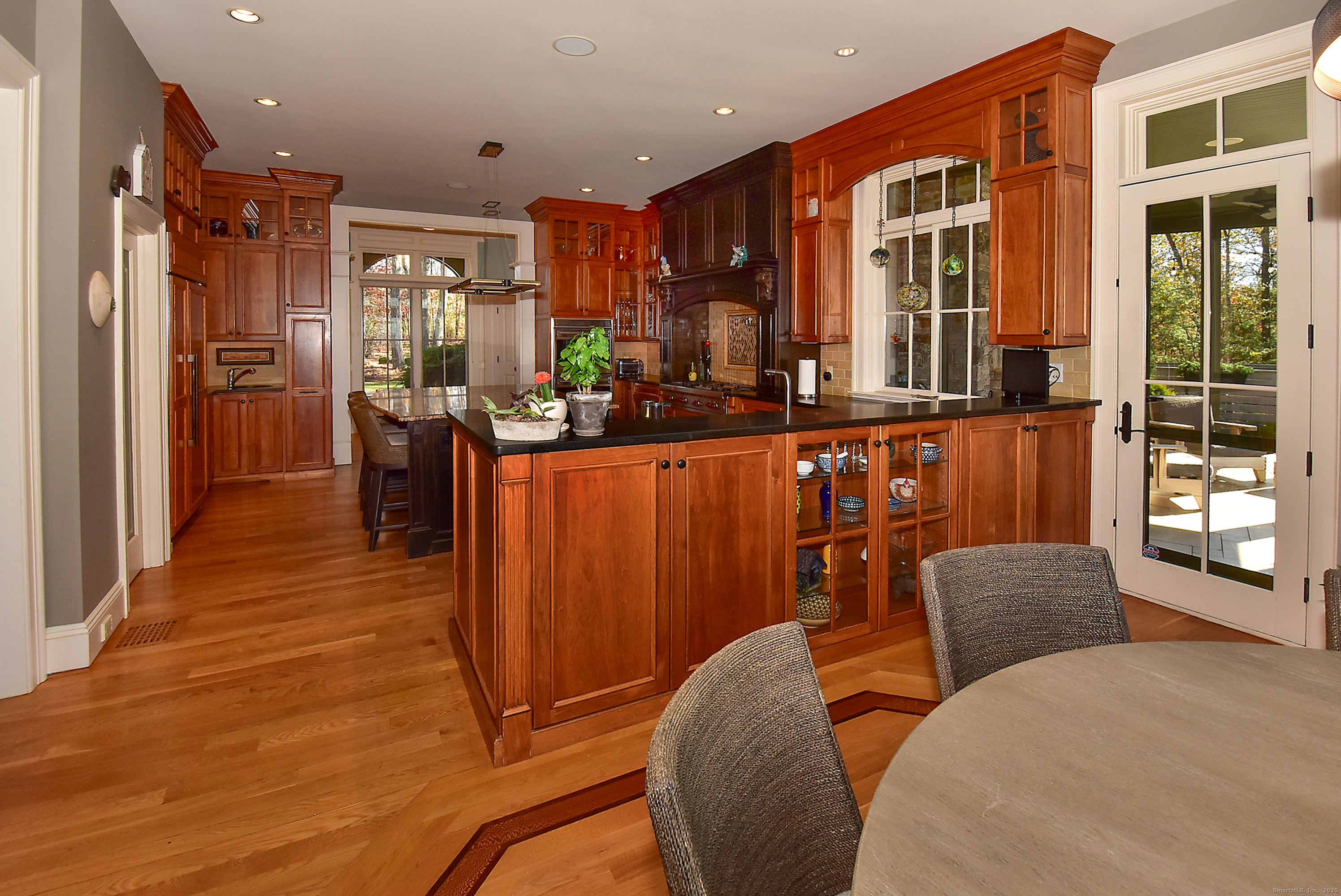 6 Setting Sun Trail Ellington, CT 06029 - Photo 11 of 40 a living room with furniture a large window and stainless steel appliances