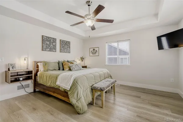a bed room with a bed and a window