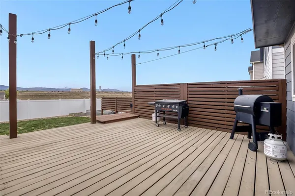 a view of a terrace with wooden floor
