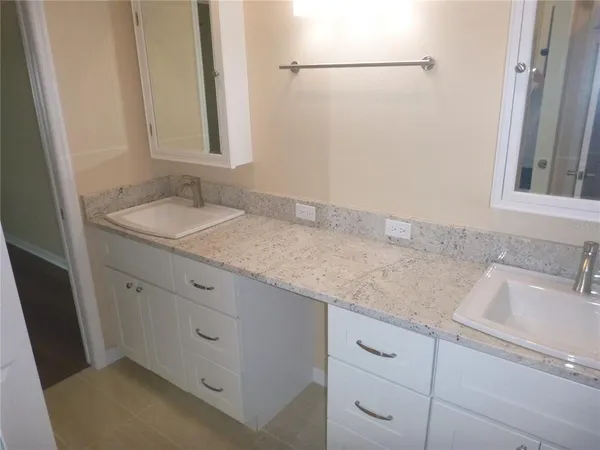 an empty room with wooden floor