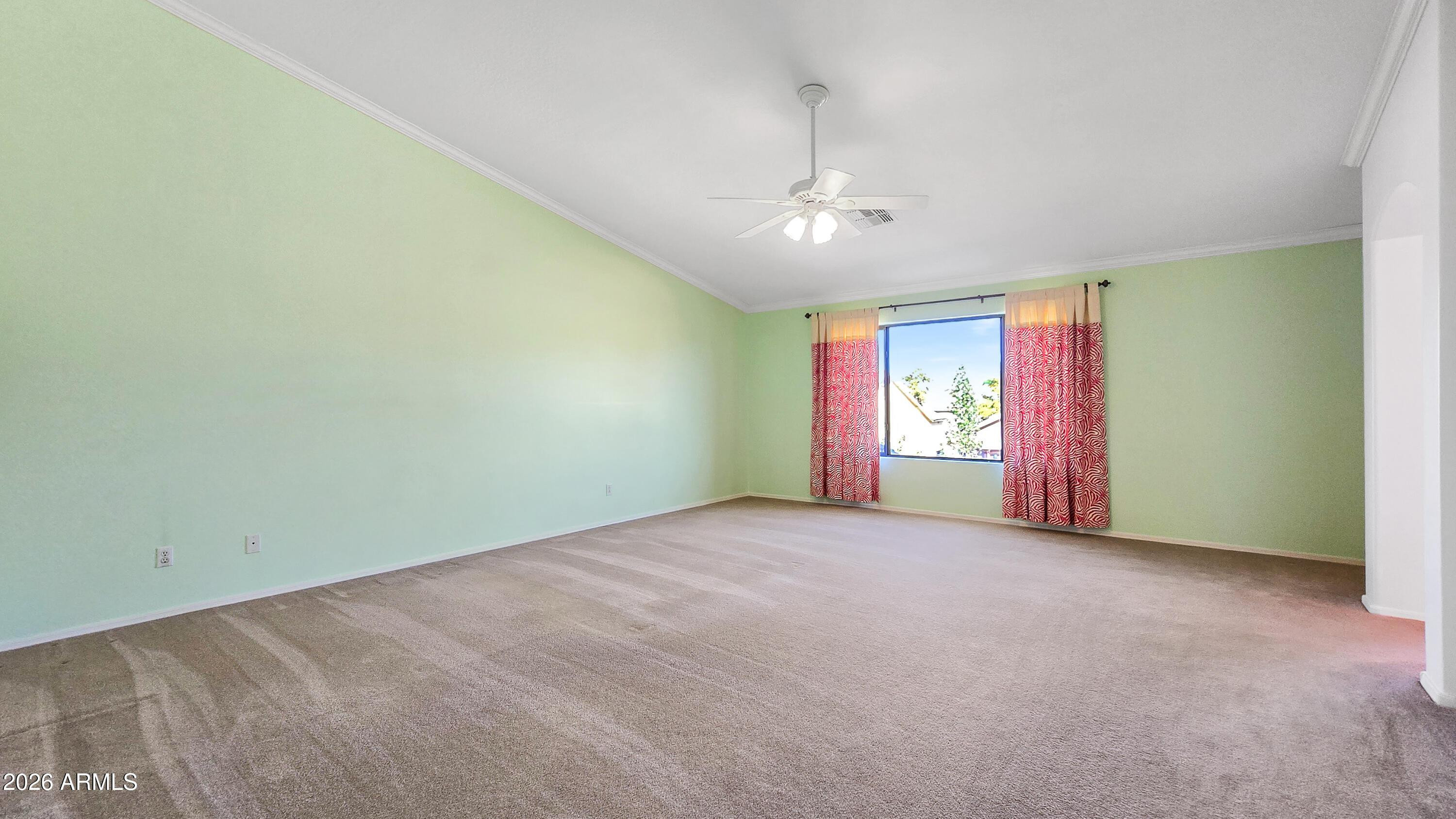 14226 West Wethersfield Road Surprise, AZ 85379 - Photo 28 of 50 an empty room with windows and closet