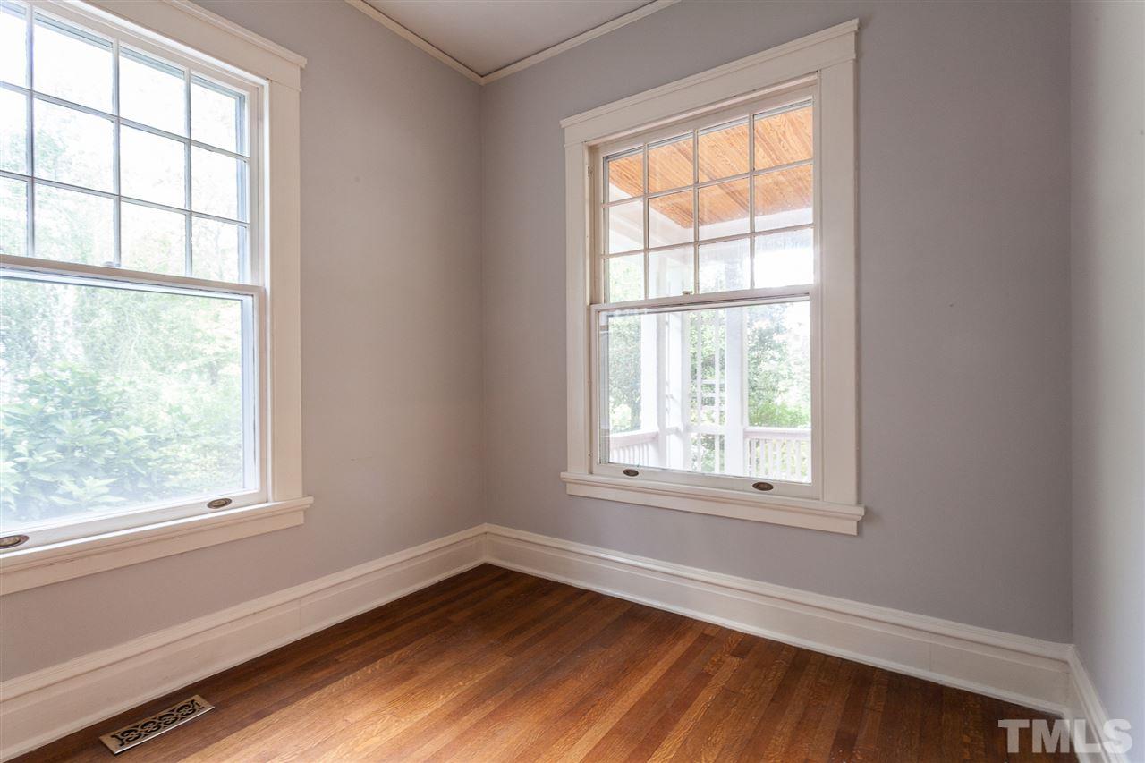 117 Forest Road Raleigh, NC 27605 - Photo 13 of 30 Bookshelves and Hardwood Floors
