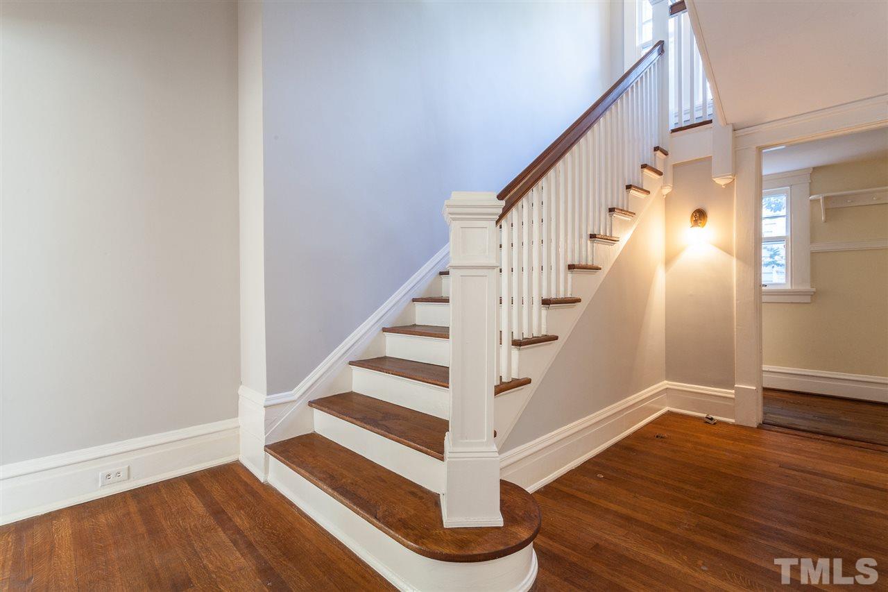 117 Forest Road Raleigh, NC 27605 - Photo 14 of 30 Hardwood Treads and Freshly Painted Foyer and Hallway