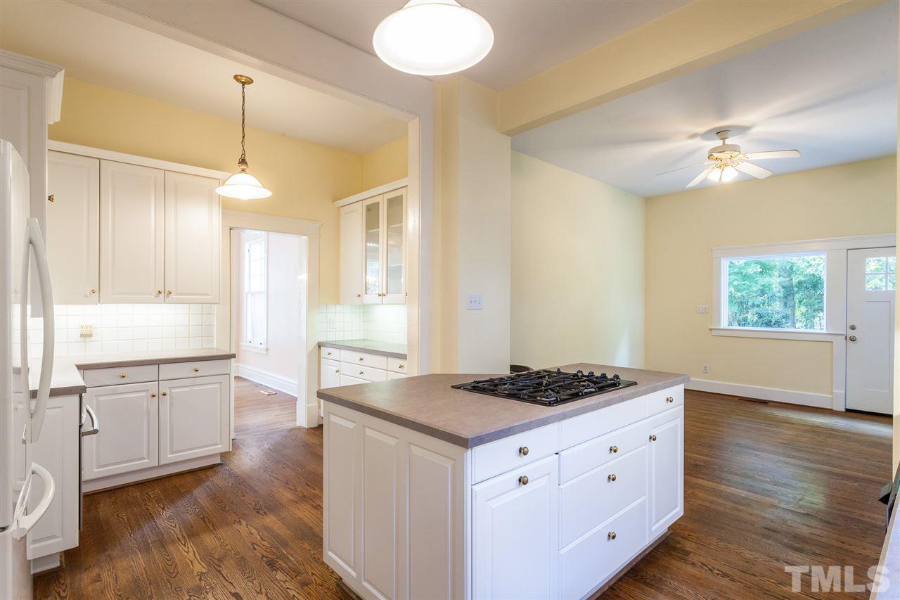 117 Forest Road Raleigh, NC 27605 - Photo 9 of 30 Gas Cooktop, Central Island, and Granite Counters