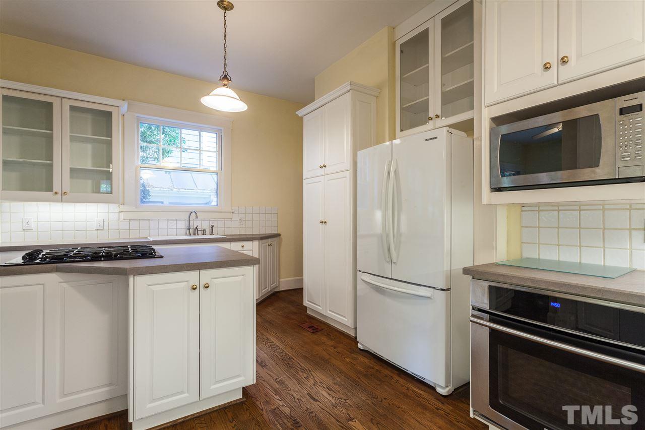 117 Forest Road Raleigh, NC 27605 - Photo 10 of 30 Hardwood Floors and Glass Accent Cabinets