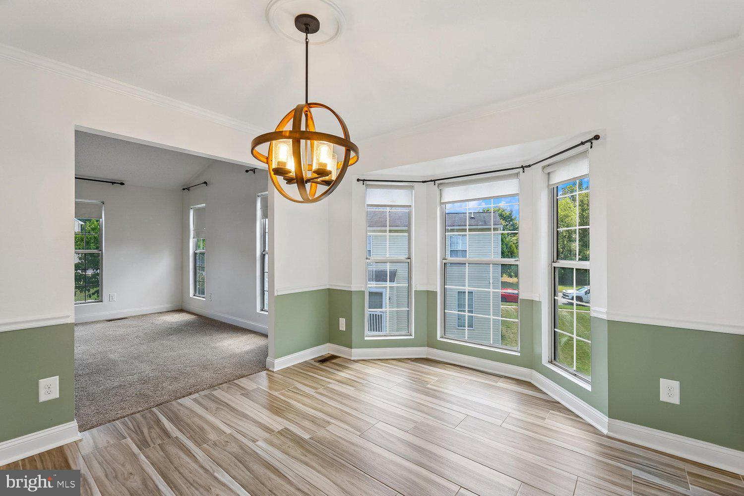 15764 Beau Ridge Drive Woodbridge, VA 22193 - Photo 8 of 58 a view of empty room with wooden floor and fan