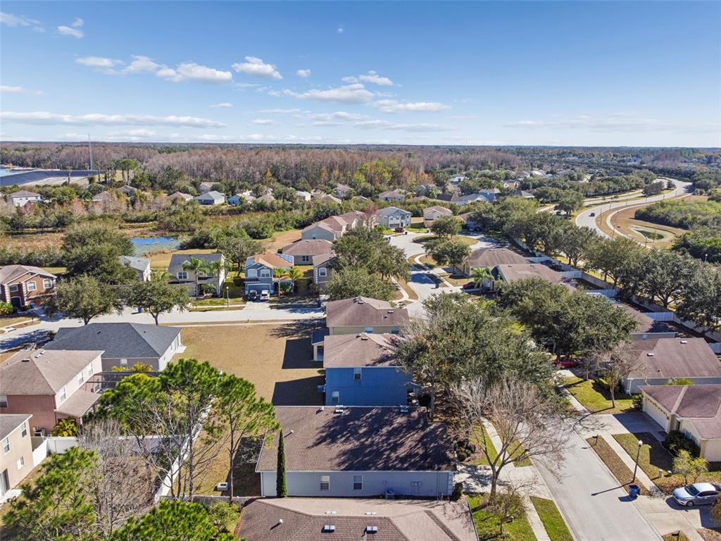 5956 Desert Peace Avenue Land O' Lakes, FL 34639 - Photo 61 of 79 an aerial view of a city