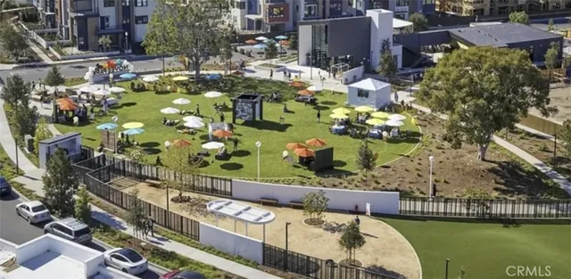 a view of a house with swimming pool and sitting area