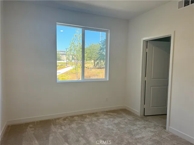an empty room with closet