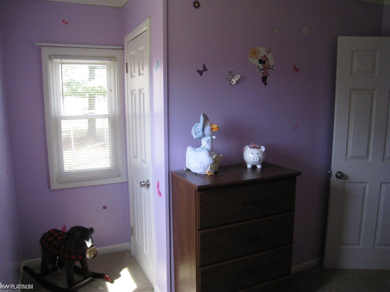 2165 Haines Road Lapeer, MI 48446 - Photo 29 of 37 L-shaped bedroom