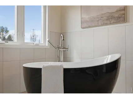 a kitchen with a sink and a window