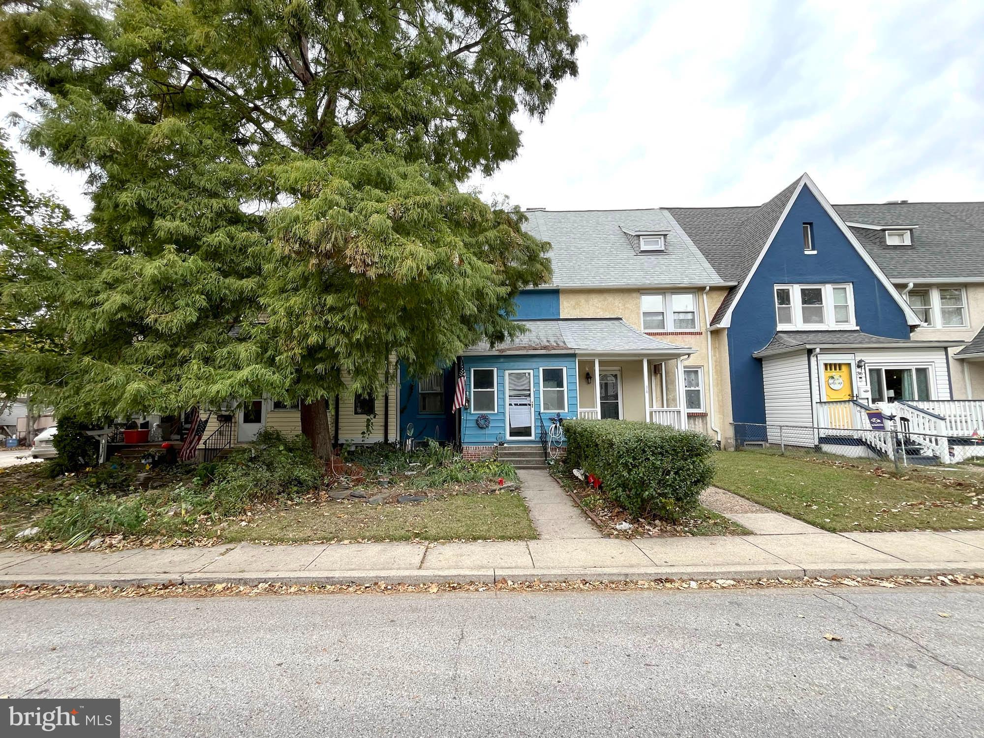 32 Township Road Baltimore, MD 21222 - Photo 15 of 16 a front view of a house with a yard