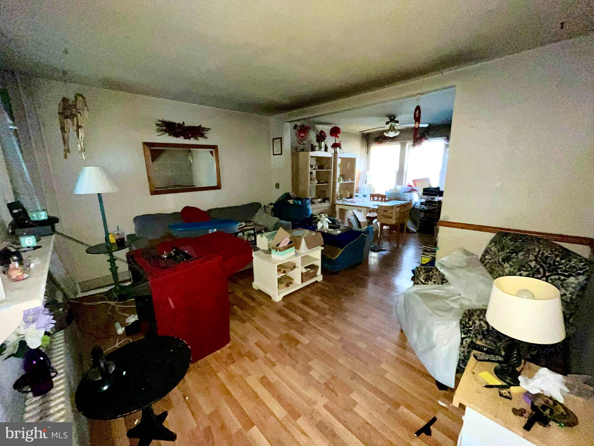 32 Township Road Baltimore, MD 21222 - Photo 3 of 16 a living room with furniture and wooden floor