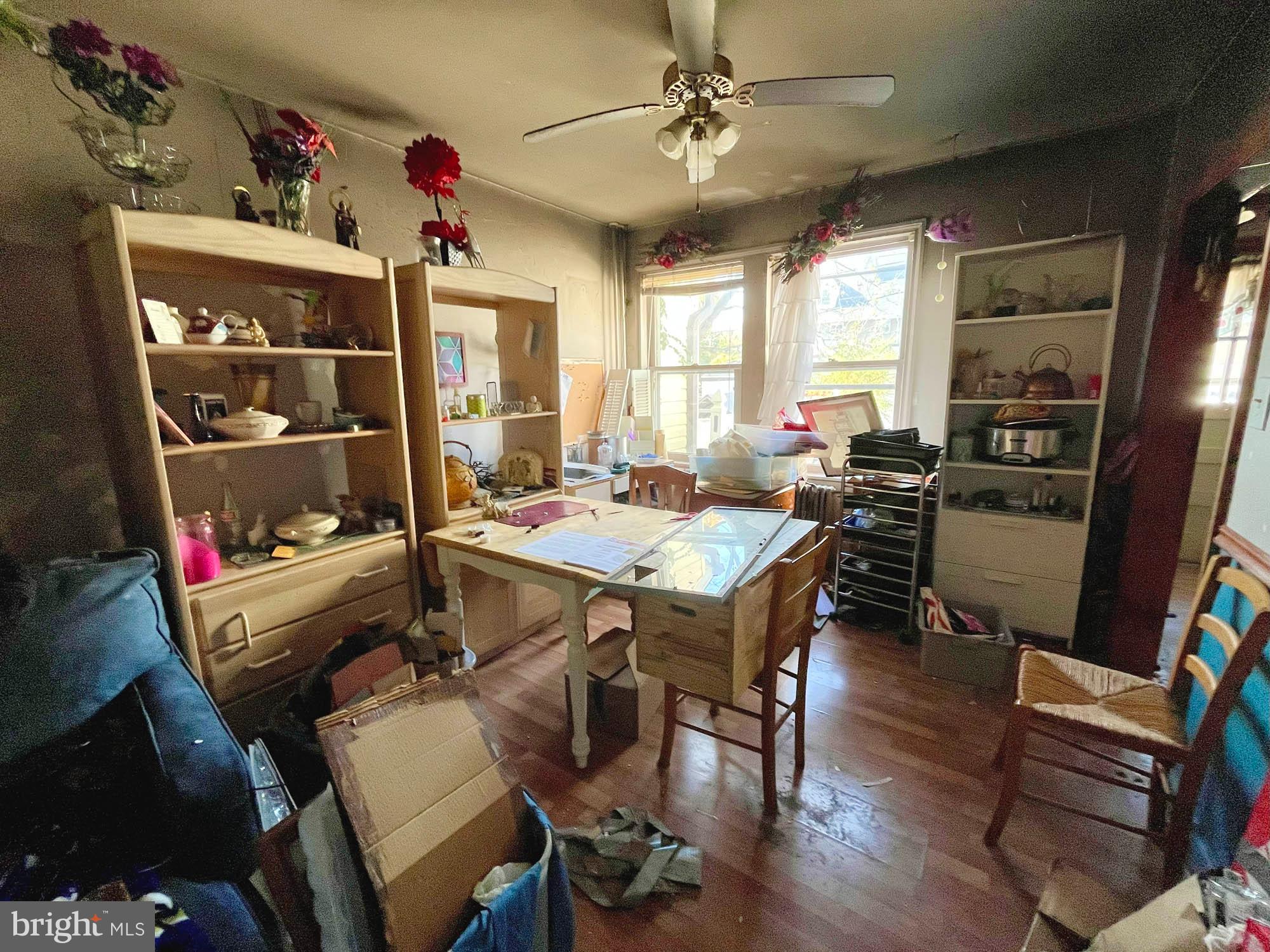 32 Township Road Baltimore, MD 21222 - Photo 5 of 16 a view of a dining room with furniture window and wooden floor