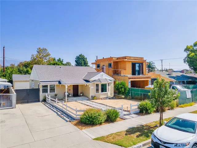 a aerial view of a house with a patio