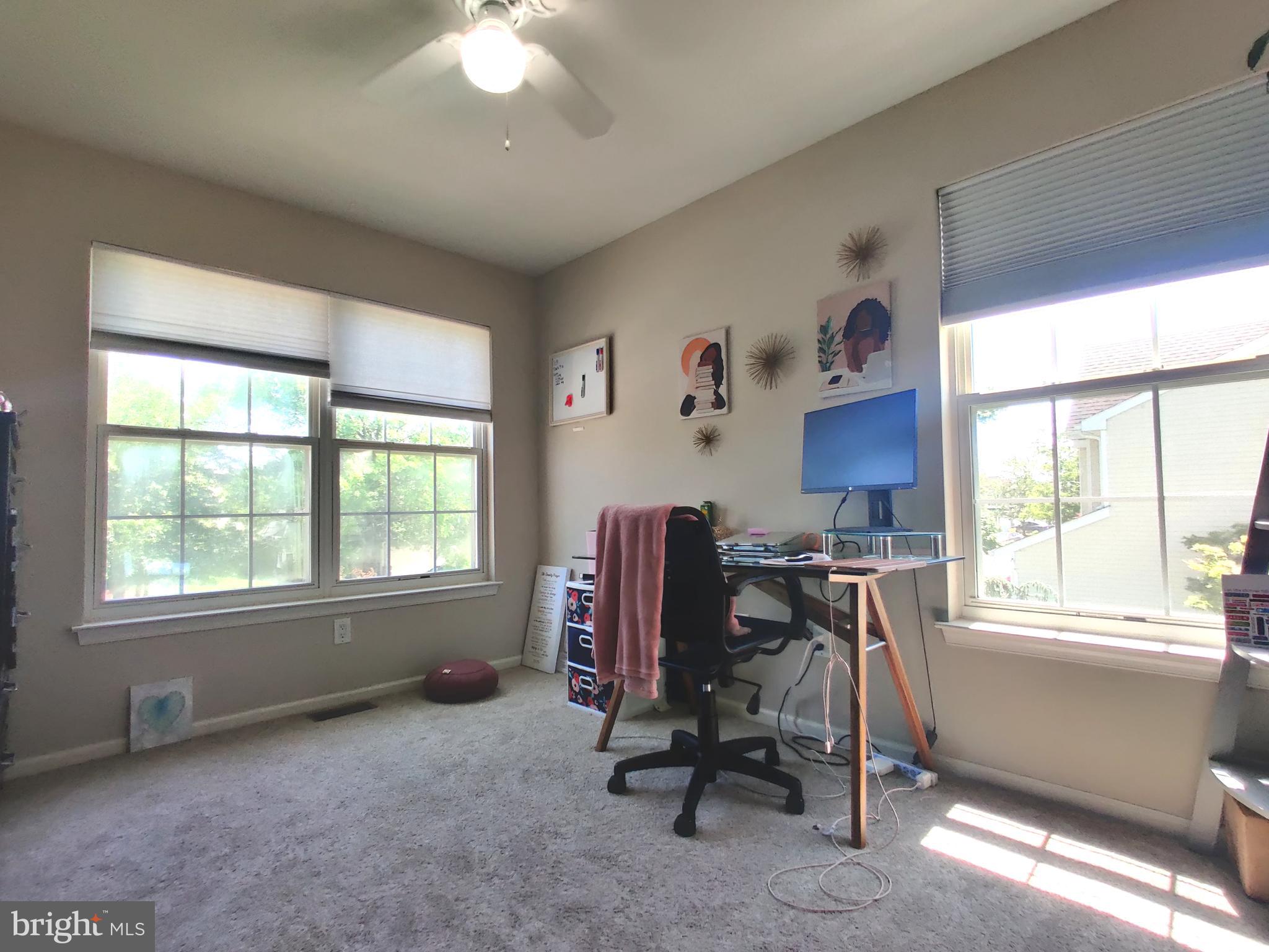 23 Stokes Road Mount Laurel, NJ 08054 - Photo 14 of 18 a view of a workspace with furniture and a window