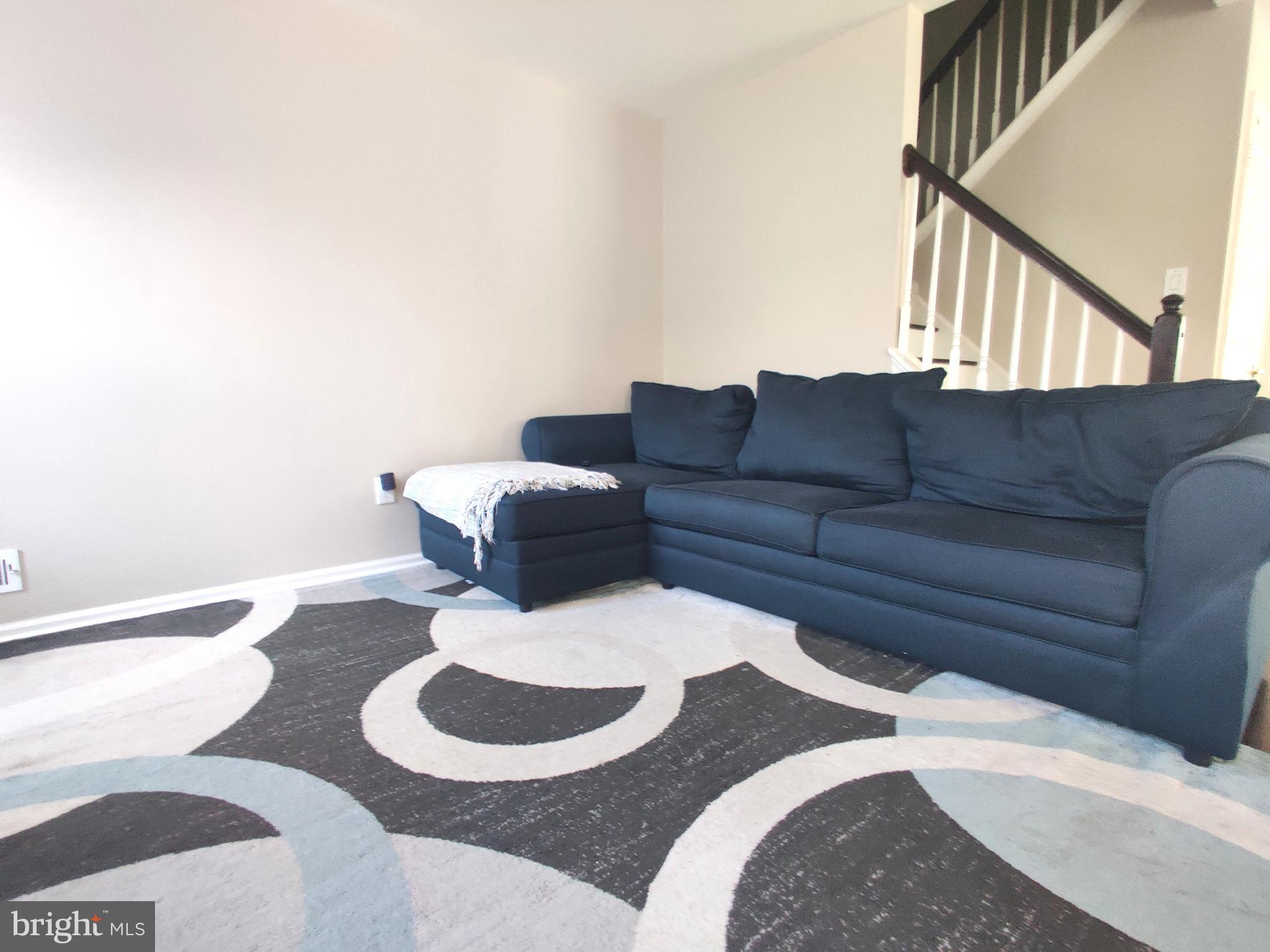 23 Stokes Road Mount Laurel, NJ 08054 - Photo 6 of 18 a living room with furniture and a wooden floor